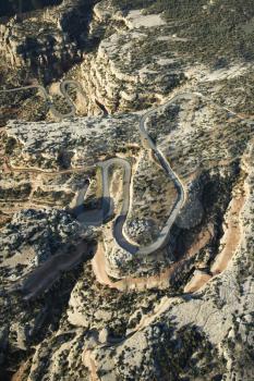 Royalty Free Photo of an Aerial of a Curvy Road in a High Desert Landscape of Utah, USA