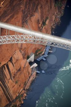 Royalty Free Photo of an Aerial of Glen Canyon Dam Bridge Over River Gorge in Arizona, USA.