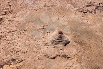 Royalty Free Photo of an Aerial of an Extruding Rock Formation in a Desert Landscape of Utah, USA