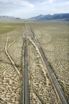 Royalty Free Photo of an Aerial of a Highway Through a Desert Landscape of California, USA