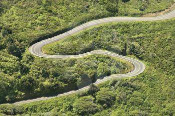 Royalty Free Photo of an Aerial of a Winding Country Road Shoreline Highway in California, USA