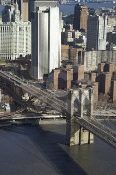 Royalty Free Photo of an Aerial View of Brooklyn Bridge with Chinatown and New York City Buildings