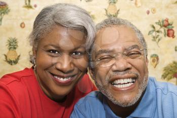 Royalty Free Photo of a Close- Up Portrait of an Older Couple Smiling