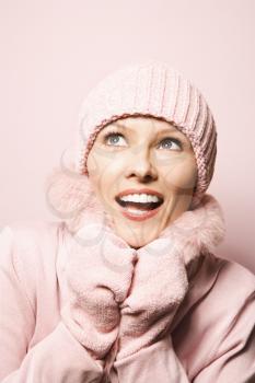Royalty Free Photo of a Woman Wearing a Winter Coat and Hat