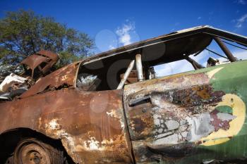Royalty Free Photo of an Old Abandoned and Rusted Car