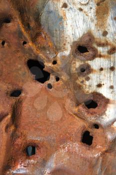 Royalty Free Photo of Old Rusty Metal With Holes