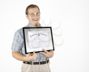 Royalty Free Photo of a Nerd Holding a Certificate and Smiling
