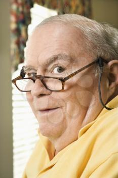 Royalty Free Photo of a Senior Man With Bifocals