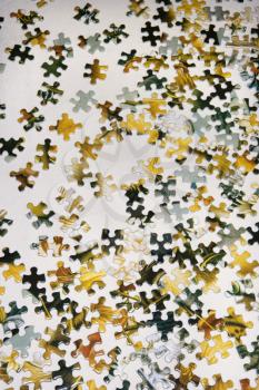 Royalty Free Photo of Puzzle Pieces on a Table