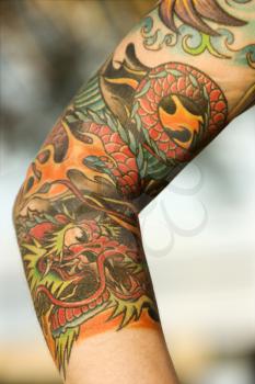 Royalty Free Photo of a Tattooed Woman's Arm 