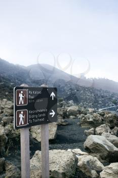 Royalty Free Photo of a Sign at Haleakala National Park Indicating Trail to Pa Ka'oao, Keonehe'ehe'e and Sliding Sands