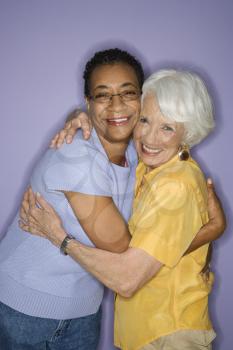 Royalty Free Photo of Older Women Hugging