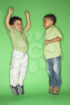 Royalty Free Photo of Children Jumping