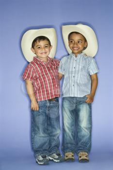 Royalty Free Photo of Children in Cowboy Hats