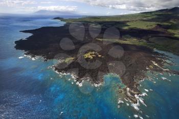 Royalty Free Photo of an Aerial of the Pacific Ocean and Maui, Hawaii Coast With Lava Rocks