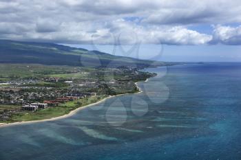 Royalty Free Photo of an Aerial of Maui, Hawaii coastline with hotel resorts and beach