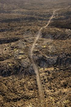 Royalty Free Photo of an Aerial View of a Trail Through Lava Rock Filled Terrain in Maui, Hawaii