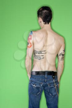 Royalty Free Photo of the Back of a Tattooed Man
