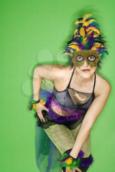 Royalty Free Photo of a Portrait of a Woman in a Mardi Gras Costume and Mask