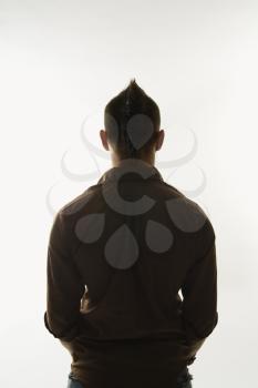 Royalty Free Photo of a Rear View of a Man With a Mohawk