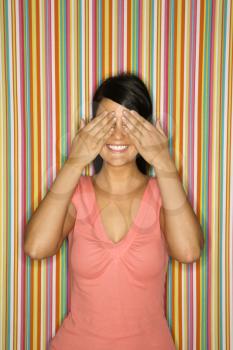 Royalty Free Photo of a Woman Covering Her Eyes