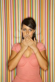 Royalty Free Photo of a Woman Covering Her Mouth