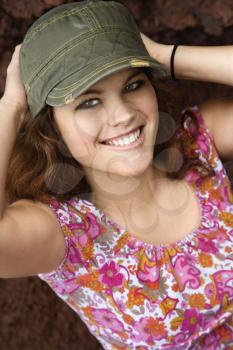 Royalty Free Photo of a Smiling Woman Wearing a Hat