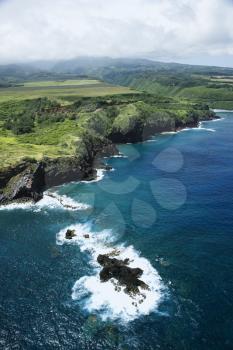 Royalty Free Photo of an Aerial View of Rocky Cliffs on Coastline of Maui, Hawaii