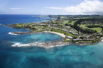 Royalty Free Photo of an Aerial View of Buildings on the Coastline of Maui, Hawaii.