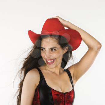 Royalty Free Photo of a Woman Wearing a Corset and Cowboy Hat
