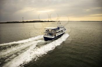 Royalty Free Photo of a Ferry Boat Transporting Passengers Across the Atlantic Ocean Near Bald Head Island, North Carolina