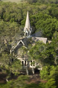 Aerial view of church surrounded by trees on Bald Head Island, North Carolina. 