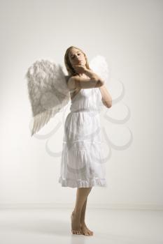 Royalty Free Photo of a Woman in a White Angel Costume
