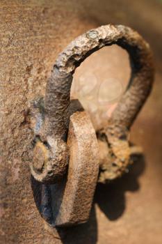 Royalty Free Photo of a Rusty Metal Ring Bracket