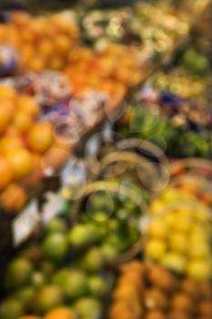 Royalty Free Photo of Blurred Fruit Stacks at a Grocery Store