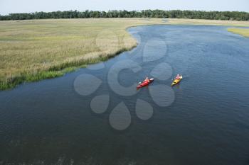Royalty Free Photo of Two Teenage Boys Kayaking on Bald Head Island, North Carolina