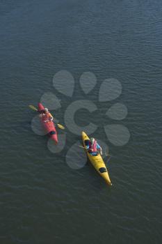 Royalty Free Photo of an Aerial Shot of Two Teenage Boys Kayaking on Bald Head Island, North Carolina