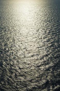 Royalty Free Photo of the Sun Reflecting on Water