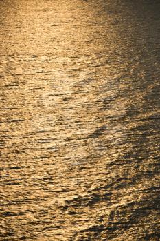Royalty Free Photo of Sun Reflecting Golden on Atlantic Ocean