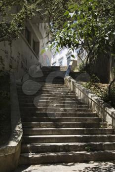 Royalty Free Photo of Sun Dappled Outside Steps in Lisbon, Portugal