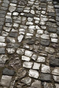 Royalty Free Photo of a Stone Inlayed Street in Lisbon, Portugal