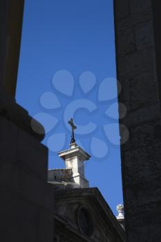 Royalty Free Photo of a Cross on Steeple in Lisbon, Portugal