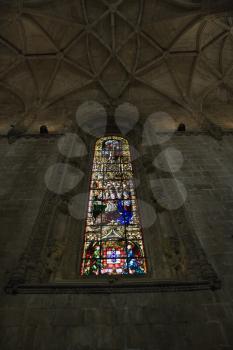 Royalty Free Photo of a Stained Glass Window Inside Mosteiro dos Jeronimos in Lisbon, Portugal