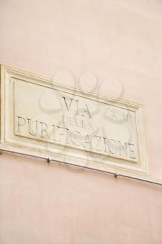 Royalty Free Photo of a Sign for Via Della Purificazione in Rome, Italy