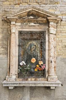 Royalty Free Photo of a Religious Shrine on the Exterior of a Building in Venice, Italy