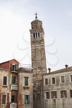 Royalty Free Photo of Buildings With a Tower in Venice, Italy