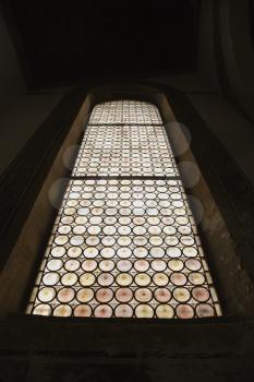 Indoor low angle view of stained glass window.