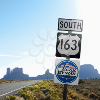 Royalty Free Photo of a Sign for Scenic Byway 163 South Beside a Road in Monument Valley, Utah