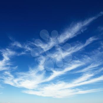 Royalty Free Photo of Wispy Cirrus Clouds in Blue Sky