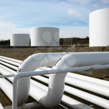 Royalty Free Photo of a Fuel Farm With Tanks and Pipes